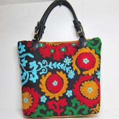 Handmade Handbag With Leather Backside/Pocket And Hand Embroidery. Fully Lined With Inside Pocket. Removable Leather Handles. Gold Hardware. Embroidered Rectangular Bucket Bag For Travel, Embroidered Pouch Bucket Bag For Everyday Use, Multicolor Embroidered Tote Bag For Daily Use, Square Embroidered Everyday Bag, Embroidered Bucket Bag For Daily Use, Embroidered Top Handle Bag For Daily Use, Multicolor Embroidered Bucket Bag, Traditional Handheld Bag With Detachable Handle, Handheld Multicolor Bags With Handwork