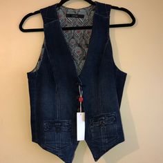 Adorable Navy Blue Jean Vest By Joe’s! Stitched Details On Back With An Adjustable Strap! Cute! Fitted Blue Denim Vest, Fitted Casual Denim Blue Vest, Casual Fitted Denim Blue Vest, Blue Fitted Denim Vest For Work, Blue Fitted Denim Vest For Office, Fitted Blue Cotton Denim Vest, Blue Denim Work Vest, Blue Denim Workwear Vest, Blue Jean Vest