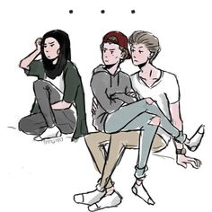 three people sitting next to each other on the ground with their hands behind their heads