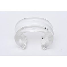 This is part of Chairish’s Costume Jewelry assortment.  The bands of clear, white and then clear again make this very chic chunky lucite cuff bracelet from the 80's so wearable and fun! It is designed by a famous Californian artist named Judith Hendler who worked in plastic jewelry at the time. This will take a wrist that is 6.5" or 7" W. It is timeless and simple. The interior diameter of the cuff is 2.25". The opening at the back of the cuff is 1.5" W. Please note: we have a wonderful collar s Modern Lucite Bangle Jewelry, Modern White Bangle For Formal Occasion, Clear Bangle Jewelry For Formal Occasions, Clear Bangle For Formal Occasions, Formal Clear Lucite Jewelry, Modern Lucite Bracelets As A Gift, Modern White Cuff Bracelet, Modern Adjustable White Bangle, Modern Clear Bracelet Jewelry