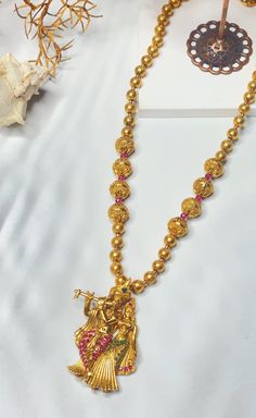 Radha Krishna Locket Gold, Spiritual Wedding Necklace For Diwali, Spiritual Bridal Necklace With Intricate Design For Rituals, Spiritual Necklace With Intricate Design For Diwali, Spiritual Necklaces With Intricate Design For Diwali, Spiritual Festive Necklace With Intricate Design, Spiritual Necklace With Intricate Design For Festive Occasions, Spiritual Necklaces For Rituals And Festive Occasions, Spiritual Kundan Necklace For Diwali Gift