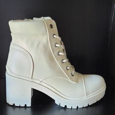 New Nine West Combat Boots Ivory In Box Beige Platform Boots In Synthetic Material, Beige Synthetic Platform Boots, Beige Synthetic Boots With Lug Sole, Cream Platform Boots With Block Heel, Cream Platform Lace-up Boots, Beige Platform Lace-up Boots For Spring, Cream High Heel Platform Boots, Beige Lace-up Synthetic Boots, Cream High-top Boots Medium Width