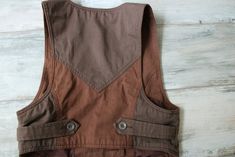 DIESEL Womens Vest Two Tone Brown Waistcoat M/L Size > Tag : Diesel > 100% Cotton > Lining : 100% Polyester > Label size is L, but looks smaller, see measurements NOTE : Actual colors may vary. This is due to the fact that each monitor has different possibilities for displaying colors and that everyone sees these colors in their own way. Great Vintage Condition Measurements (laying flat) : Length : 46 cm / 18.1'' (front) Length : 38 cm / 15'' (back) Armpit to armpit : 42 cm / 16.5'' Cotton Vest With Pockets For Workwear, Cotton Work Vest With Pockets, Cotton Workwear Vest With Pockets, Cotton Vest With Pockets For Fall, Fall Cotton Vest With Pockets, Fall Cotton Vest With Side Pockets, Brown Cotton Vest With Buttons, Brown Cotton Vest For Fall, Brown Cotton Vest With Button Closure