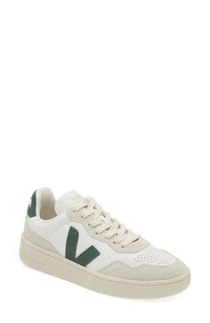 Complete your casual ensembles with this low-cut leather sneaker featuring perforations on the toe for comfortable ventilation. Leather upper/textile lining/synthetic sole Removable insole Made in Brazil White Sneakers With Perforated Toe Box For Spring, White Spring Sneakers With Perforated Toe Box, Spring White Sneakers With Perforated Toe Box, Everyday White Canvas Sneakers, Green Sneakers With Perforated Toe Box For Spring, Spring Sneakers With Gum Sole, Green Sporty Sneakers For Everyday, Green Spring Sneakers With Perforated Toe Box, Spring Green Sneakers With Perforated Toe Box