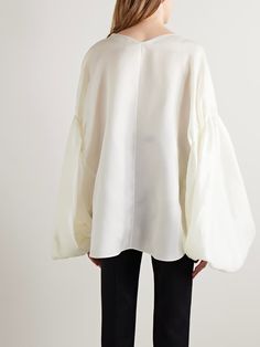 KHAITE Quico oversized silk blouse | NET-A-PORTER Elegant Long Sleeve Blouse With Set-in Sleeves, Designer Silk Blouse For Fall, Chic Tops With Blouson Sleeves, Chic Tops With Voluminous Blouson Sleeves, Voluminous Blouse With Blouson Lantern Sleeves, Evening Tops With Gathered Balloon Sleeves, Voluminous Blouse With Gathered Balloon Sleeves, Chic Voluminous Long Sleeve Blouse, Designer Silk Tops For Spring