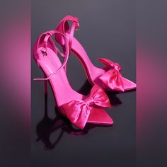 Featuring A Pink Satin Material With A Point-Toe Design And A Bow Detail, We Are Obsessed. Material: Satin Heel Height: 4.5” Extra Heel Taps Included Trendy Pink Heels With Bow, Pink Pointed Toe Sandals With Bow, Feminine Fitted Sandals With Pointed Toe, Pink Pointed Toe Sandals For Prom, Pink Pointed Toe Prom Sandals, Fitted Bow Sandals For Party, Feminine Fitted Sandals For Party, Feminine Closed Toe Heels For Party, Feminine Heel Strap Heels For Party