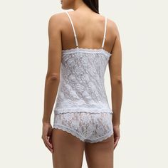 Hanky Panky sheer lace camisole. V neckline. Sleeveless. Scalloped trim. Fitted silhouette. Pullover style. Nylon; nylon/spandex trim. Hand wash. Made in USA.