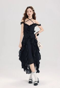 Embrace your unique style with the Ruffled Asymmetric Hemline Sleeveless Dress, perfect for making a confident, fashion-forward statement. Crafted from a blend of premium fabrics, this dress boasts a playful yet sophisticated ruffled asymmetric hem and a flattering high-waisted silhouette. The solid black color creates a versatile canvas for a variety of texture play, while the V-neckline and sleeveless design enhance its elegant charm and make it ideal for warm weather outings. Pair this dress Confident Fashion, Types Of Skirts, Asymmetrical Dress, Summer Wear, Asymmetric Hem, Ruffle Dress, Solid Black, Black Color, Unique Style