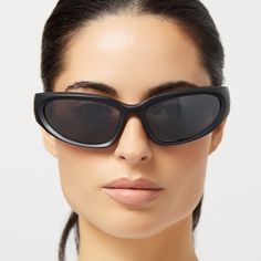 Low-riding sunnies with wrap-around coverage. Side Out shades include a TR90 lightweight frame and protective nylon polarized lenses. Totally functional and absolutely fashionable, the new Side Out shades can go from the runway to the racetrack in 2.5 seconds. Black Shield Sunglasses With Uva Protection For Beach, Black Sunglasses For Summer Outdoor Activities, Sporty Black Sunglasses With Gradient Lenses, Sporty Black Sunglasses With Uv Protection, Sporty Black Sunglasses With Tinted Lenses, Black Polarized Shield Sunglasses For Outdoor Activities, Black Anti-reflective Shield Sunglasses For Beach, Black Sporty Shield Sunglasses With Uva Protection, Black Shield Sunglasses With Tinted Lenses For Outdoor Activities