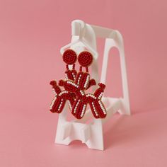 Elevate your style with our playful balloon dog dangle earrings. Handmade and beaded, they fuse fun with elegance for a unique statement piece. Add charm to any outfit! Diy Templates, Red Balloon, Balloon Dog, Earrings Red, Cap Hair, Halloween Projects, Easter Diy, Party Inspiration, Elevate Your Style