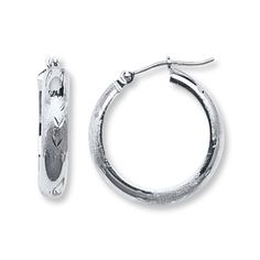 A diamond-cut pattern etched into 14K white gold enhances these versatile hoop earrings for her. The earrings secure with hinged backs. White Gold Huggie Jewelry With Diamond Cut, Small Hoop Sterling Silver Jewelry With Diamond Cut, Silver Diamond Cut Huggie Jewelry, Small Hoop Engraved Earrings, Silver Huggie Jewelry With Diamond Cut, White Gold Hoop Pierced Jewelry, White Gold Hoop Pierced Earrings, White Gold Pierced Hoop Jewelry, Sterling Silver Hoop Jewelry With Diamond Cut