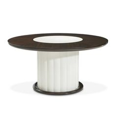 a round table with white and brown accents