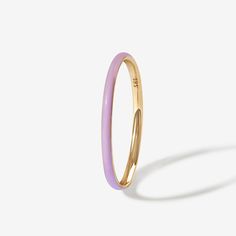 This is the pastel pop you didn't know you needed until right now. Minimal by design, Oburu lavendaer lights up your hands and your jewelry box. Slim, intense and vibrant enamel unexpectedly plays well with others. Created for you in solid 14 karat gold, you'll want to wear this ring always and never take it off, even when in the shower or at the gym. Enamel Engagement Ring, Modern Enamel Ring For Gift, Trendy Enamel Ring For Everyday, Modern Yellow Gold Enamel Ring Gift, Modern Everyday Enamel Jewelry, Wedding Stack, Gold Enamel Jewelry, Enameling Jewelry, Enamel Rings