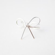 Sterling Silver Bow Knot Ear Cuff Minimalist Silver Jewelry With Bow, Wrap Earrings, San Gabriel, Knot Design, Silver Bow, Bow Knot, Silver Wire, Wire Wrapped, Ear Cuff