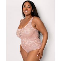 A gorgeous bodysuit with a romantic floral pattern that doesnt show through under your clothes. Soft all-over lace is semi sheer opacity due to the floral design, providing more modest coverage yet still lightweight and breathable. 360 degrees of stretch that supports for easy all-day wear and comfort. This plus size floral lace bodysuit gives you sexy style & ultimate comfort in one. Smooth to the touch, made of one layer of stretch lace with mesh. Bottom hook and eye adjustability makes this b Sleeveless Lace Bodysuit With Lace Closure, Sleeveless Lace Bodysuit With Built-in Bra, Lace Shapewear Bodysuit With Lined Body, Sleeveless Lace Bodysuit With Lined Body, Feminine Lace Bodysuit With Lined Body, Sleeveless Lace Bodysuit, Scoop Neck Bodysuit, Shapewear Tops, Sheer Bodysuit