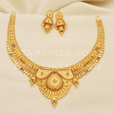 Adorn yourself with this elegant gold necklace, featuring a delicate chain and a stunning, handcrafted pendant. Its versatile design makes it a perfect accessory for both casual and formal looks, adding a subtle touch of glamour to your ensemble. 22kt yellow gold handmade necklace jewelry from Rajasthan India. Brand- StarLikesGoldIndia Weight- 26.63 grams approx. Metal- yellow gold real gold. Metal purity- 22 Karat. Max Length - Necklace 4 inches approx. Earrings - 3 centimeter approx Max Width- Simple Design Gold-plated Yellow Gold Jewelry, Simple Design Gold Plated Yellow Gold Jewelry, Gold Temple Jewelry Chain Necklace Gift, Simple Gold-plated Yellow Gold Jewelry, Festive Gold Necklace With Round Shape, Gold Temple Jewelry Style Chain Necklace, Gold Chain Necklace With Simple Design For Gift, Gold Temple Jewelry Necklaces As Gift, Gold Bridal Necklace With Pendant And Elegant Design