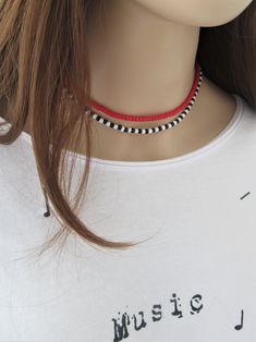 "Be bold to mix these beaded chokers with the gold jewelry. It's a perfect layering! This listing is for ONE CHOKER. Just choose \"Red choker\" or \"Black-White Choker\" in the drop down menu when ordering. If you need both, please, put this listing at cart twice. We have other color chokers, please, check our store. DETAILS - Japanese glass seed beads 4 mm - Quality strong nylon string - Choker length. Choose in the drop down menu - Lobster or round clasp closure. Available gold tone (default) Red Necklaces, Red Choker Necklace, Short Beaded Necklace, Red Choker, White Choker, Necklaces Beaded, Waist Jewelry, White Beaded Necklaces, Layered Choker Necklace