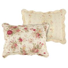 two pillows with floral designs on them, one is white and the other has pink flowers