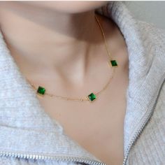 "Through time, emerald has been known as a symbol of truth and love. This necklace is a trendsetting statement that flaunts luscious Emerald pendants to add a classic touch to your look.  Details: 15.4\" length + 2.4\" extension 0.2 oz 18K Gold-Plated Tarnish-Free  Hypoallergenic and Nickel-Free" Green Jeweled Necklaces For Anniversary, Green Jeweled Necklace For Anniversary, Green Sterling Silver Necklace With Jewels, Luxury Green Emerald Gold-plated Necklace, Fine Jewelry With Green Clavicle Chain, Green Fine Jewelry Collar Necklace, Green Clavicle Chain Fine Jewelry, Fine Jewelry Emerald Clavicle Chain, Green Pendant Jewelry With Clavicle Chain