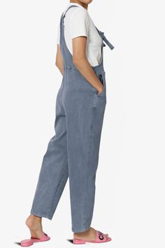 Embrace everyday chic with these denim overalls that blend utility and style. Their adjustable straps and relaxed fit ensure all-day comfort, perfect for casual outings.Made with a soft cotton blend and durable twill, these versatile one-piece jumpsuits are a wardrobe staple for any season.The cropped tapered legs and bib pocket add a contemporary touch to the timeless design, while slant pockets merge convenience with streetwear vibes.Ideal for casual travel, weekend wear, or special occasions, Cotton Relaxed Fit Shortalls With Adjustable Straps, Cotton Shortalls With Adjustable Straps And Relaxed Fit, Casual Everyday Denim Jumpsuit, Casual Cotton Denim Jumpsuit With Adjustable Straps, Casual Denim Blue Jumpsuit For Everyday, Utility Denim Blue Cotton Shortalls, Utility Cotton Overalls With Adjustable Straps, Cotton Utility Overalls With Adjustable Straps, Relaxed Fit Straight Leg Overalls With Pockets