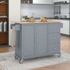 Rolling Mobile Kitchen Island with Drop Leaf - Solid Wood Top, Locking Wheels & Storage Cabinet 52.7 Inch Width（Dark blue）","Features【Foldable drop-leaf】It has a large enough table top, this island is suitable for both cooking and eating, Moreover, putting down the drop-leaf will save you more space. Desktop and falling leaf are metal support frames, which are more solid and durable.【Solid & Sturdy Kitchen Cart】Premium MDF material and rubber wood tabletop add a durable and eco-friendly advantag Kitchen Island With Drawers, Drop Leaf Kitchen Island, Sophisticated Kitchen, Mobile Kitchen Island, Kitchen Island On Wheels, Mobile Kitchen, Black Kitchen Island, Rolling Kitchen Island, Solid Wood Kitchens