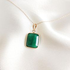 This stunning pendant is set in 14k Solid Yellow Gold with Natural Emerald with utmost precision. It is an unique gemstone Pendant for nearly every occasion and is completely hassle-free jewelry. 🔷ABOUT GEMSTONE:  Emerald is often associated with love and romantic relationships. It is believed to promote love, loyalty, and unity, making it a popular choice for engagement and anniversary jewelry. Emerald is often associated with abundance and financial success. It is believed to attract prosperi Formal Emerald Rectangular Pendant Jewelry, Spiritual 14k Gold Gemstone Jewelry, Fine Emerald Jewelry In Rectangular Shape, Formal Jewelry With May Birthstone Rectangular Pendant, Rectangular Emerald Gemstone Necklace, Rectangular Emerald Necklace Fine Jewelry, Rectangular Emerald Fine Jewelry Necklace, Rectangular Emerald Fine Jewelry, Fine Jewelry Emerald Rectangular Pendant