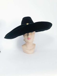 For Sale on 1stdibs - 1930s Black High Design Picture Hat made of velvet and twill with Bakelite and rhinestone accent. HIgh crown and wide rolled brim. This hat was part of Elegant Wide Brim Costume Hat, Elegant Curved Brim Hat For Costumes, Vintage Formal Hat With Structured Crown, Vintage Formal Hats With Structured Crown, Vintage Wide Brim Felt Hat For Evening, Vintage Curved Brim Felt Hat For Evening, Vintage Wide Brim Costume Hat For Evening, Vintage Felt Hat With Curved Brim For Evening, Vintage High Crown Costume Hats For Formal Occasions