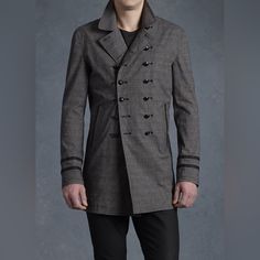 John Varvatos Textured Trench Coat. Size Small Brand New With Out Tags. Color Grey. Tailored Outerwear With Button Cuffs For Business Casual, Fitted Double-breasted Outerwear With Buttons, Designer Fitted Outerwear For Business, Fitted Stand Collar Pea Coat For Business, Fitted Pea Coat With Stand Collar For Business, Semi-formal Double-breasted Outerwear With Buttons, Designer Tailored Outerwear With Double Button Closure, Fitted Double-breasted Business Outerwear, Semi-formal Double-breasted Button-up Outerwear