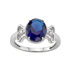 Elevate your look with the sophisticated style of this lab-created sapphire and diamond accent ring.RING DETAILS Width: 0.43 in. Metal: sterling silver Plating: rhodium STONE DETAILS Stone type: lab-created sapphire Total weight: 2 1/3 ct. Shape: oval Setting: prong DIAMOND DETAILS Total weight: less than 1/10 ct. Shape: single cut Color grade: I-J Clarity: I2-I3 Setting: pave Gemstones may have been treated to enhance their appearance. Special care may be required. Please visit our Gemstone Tre Elegant Formal Birthstone Ring With Lab-created Sapphire, Elegant Formal Lab-created Sapphire Birthstone Ring, Elegant Sapphire Birthstone Ring With Diamond Accents, Formal Lab-created Sapphire Birthstone Ring, Elegant Rings With Diamond Accents And Lab-created Sapphire, Formal Birthstone Ring With Diamond Accents, Elegant Sapphire Birthstone Ring With Gemstone Accents, Formal Sapphire Birthstone Ring With Accent Stones, Formal Birthstone Ring With Lab-created Sapphire And Accent Stones