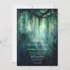 a wedding card with an image of trees and lights