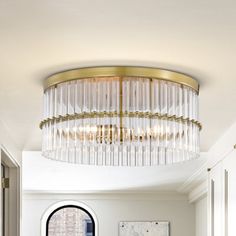 a living room filled with furniture and a chandelier