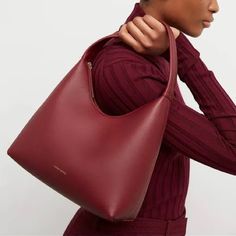 Mansur Gavriel Soft Candy Bag In Burgundy The Brand's Famed Candy Bag Has Been Softened Up (Think Ice Cream And Frosting) In Textured, Soft Calfskin Leather, Yet Remains The Sweet Style It Always Was. 10.5"W X 7"H X 4.5"D Top Zip Closure Shoulder Strap Interior Wall And Pocket Suede Lining Leather Made In Italy Retail $545 New W/Tag; Some Pressure Marks From Storage. Classic Large Capacity Burgundy Shoulder Bag, Modern Burgundy Bag With Double Handle, Red Top Handle Shoulder Bag For Fall, Red Top Handle Bag For Fall, Versatile Burgundy Bags, Modern Burgundy Bag With Removable Pouch, Modern Burgundy Bags With Removable Pouch, Modern Burgundy Shoulder Bag For Office, Red Office Bag For Fall