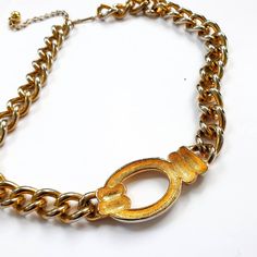 "A beautiful gold chain choker , Great Gift Idea Condition: Great vintage condition Measurements: total Length : 19.7\" / 50 cm We Offer: * Worldwide Shipping * Free Tracking Number * Free Gift Wrapping * Helpful Customer Service ---------------- * ALL ITEMS https://www.etsy.com/shop/VintageNr5 * Every garment we sell is authentic vintage and one-of-a-kind! You will receive the exact item photographed. * For sales and promotions, follow us @vintagenr5 * Subscribe email list and be the first to k Vintage Clavicle Chain Choker, Vintage Chain Choker Necklace, Vintage Choker Chain Necklace, Vintage Metal Clavicle Chain Necklace, Gold Vintage Choker With Clavicle Chain, Retro Gold Jewelry With Adjustable Chain, Retro Gold Choker Necklace, Vintage Style Chunky Chain Necklace As Gift, Vintage Chunky Chain Necklace As Gift