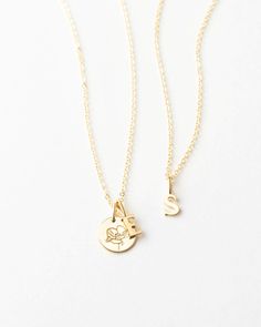 A timeless serif pendant adorned on an elegant chain says it with sophistication. Create a custom look by adding extra letters, disks, or tags with our personalized add-ons. Dainty Initial Necklace With Charms For Personalized Gift, Delicate Everyday Charm Necklaces With Initial Pendant, Minimalist Initial Necklace With Charms As Personalized Gift, Dainty Initial Necklace With Charms, Delicate Everyday Charm Necklace With Initial Pendant, Minimalist Initial Necklace With Charms For Personalized Gift, Minimalist Charms Initial Necklace For Personalized Gift, Dainty Initial Pendant Name Necklace With Charms, Everyday Personalized Initial Pendant Charm Necklace