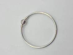 Designer Pandora 925 Silver Signature clasp Bangle Charm Bracelet Item w# 1527 Clean and in good condition 6.5 inch inner circumference Sterling Silver Bangle With Lobster Clasp, Sterling Silver Bracelet With Spring Ring Clasp, Silver Bangle Bracelet With Clasp, Bethlehem Pa, Pandora Charm, Bangle Bracelets With Charms, Charm Bangle, Bethlehem, Charm Bracelets