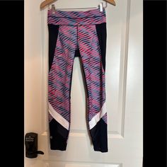 Athleta Nwot Navy Blue With Hot Pink, Grey And White Accents. The Pants Have A Zip Pocket On The Back Of The Waist Band. The Are Made Of 78% Polyester And 22% Lycra. Spring Pink Activewear For Jogging, Sporty Multicolor Leggings For Sports, Casual Pink Activewear For Jogging, Casual Spring Running Leggings, Pink Go-dry Bottoms For Training, Pink Athleisure Activewear For Jogging, Casual Blue Leggings For Jogging, Sporty Spring Activewear Long Pants, Sporty Multicolor Gym Bottoms