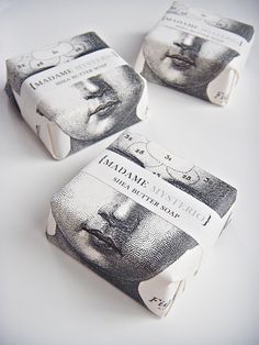 three rolls of toilet paper with the faces of abraham lincoln and thomas washington on them