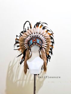 Orange Feather Indian Headdress Replica This Headdress is 100% handmade from feathers. * Head circumference: 59 centimeters / 23 inches * Length : Short * Beads color and pattern may vary each headdress WHY US? * 100% Handmade and Eco Friendly Product * Finest Quality - Each item will go through a Quality Control process before shipping. * No Markup Price * Every purchase supports Balinese Artisans - All Artisans will keep on following their passions while providing for their families. SHIPPING Festival Costume Hats And Headpieces With Feathers, Festival Feathered Costume Hat, Festival Costume Hat With Feathers, Indian Hat, Eco Friendly Product, Native American Feathers, Festival Costume, Indian Headdress, Summer Purses