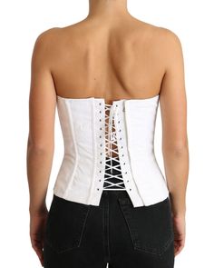 Brand: Dolce & Gabbana Model: Strapless bustier corset top Color: White Material: 97% Cotton 3% Elastane Lining: 94% Silk 6% Elastane Zipper closure Logo details Made in Italy Material: 97% Cotton 3% Elastane Fitted Bandage Corset Belt, White Underbust Corset With Built-in Bra, Elegant Bandage Corset Belt, White Bandage Corset For Party, Fitted Corset Belt With Straps, Fitted Bandage Bandeau Corset, Fitted Bandeau Bandage Corset, Fitted Bandeau Corset With Bandage Details, Fitted Underbust Bandage Corset Belt