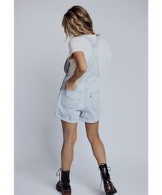 The Levi Vintage Shortalls are a timeless classic, season after season. They have a vintage-inspired look, but feature modern stretch-infused denim for comfort and give. Color: light denim Shell: 79% cotton/21% lyocell Vintage-inspired denim shortalls Adjustable straps Front pouch packet with a four pocket style Machine wash cold, line dry Fits true to size Model is 5’4" wearing an XS Measurements: XS: (0-4) Waist = 31" | Hips = 37" | Rise = 12" | Inseam = 4.8" S: (6-8) Waist = 35" | Hips = 39" Relaxed Fit Cotton Shortalls, Cotton Relaxed Fit Shortalls, Cotton Shortalls With Relaxed Fit, Casual Short Overalls For Spring, Casual Short Length Overalls For Spring, Casual Spring Overalls In Short Length, Casual Short Spring Overalls, Casual Spring Short Overalls, Levi's Shortalls With Pockets For Summer