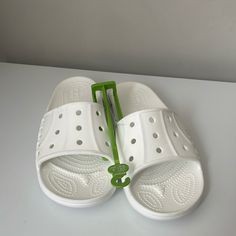 Crocs Baya Ii Sandal Comfortable Two Strap Upper Fully Molded Croslite Material For Signature Iconic Crocs Comfort Lightweight Flexible Easy To Clean And Quick To Dry White Closed Toe Casual Flip Flops, Casual White Closed Toe Flip Flops, Casual White Non-slip Flip Flops, White Closed Toe Casual Slides, White Casual Closed Toe Slides, Casual White Closed Toe Slides, Crocs Baya, Shoes Crocs, Women's Crocs