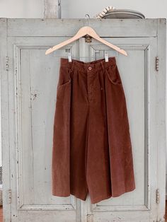 Rare vintage Levi's brown corduroy culottes in great vintage condition. Best suited for modern extra small/small. Please see measurements. *Measurements:  *Fabric: Corduroy *Great vintage condition:  Some general wear  but no noticeable marks, stains or tears. No returns or exchanges Items are Found and often Vintage. Some imperfections are to be expected.  They are part of the items journey and should be appreciated. Although I don't accept returns at this time, please contact me if you have any issues. Always happy to send more pics! Vintage Levis Corduroy, High Waist Retro Corduroy Bottoms, Retro High-waist Corduroy Bottoms, Vintage Brown Cotton Bottoms, Retro Wide Leg Corduroy Bottoms, Vintage Brown Bottoms With Pockets, Vintage Brown Wide Leg Pants, Vintage Wide Leg Brown Bottoms, Vintage Brown Wide Leg Bottoms