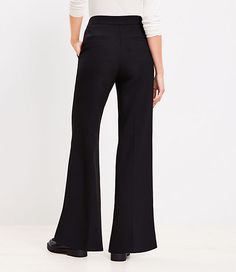 ,Pants Details:Details: Front zip with hook and bar closure. Slash pockets. Back welt pockets.,Leg Shape:Leg Shape: Trouser - fitted through the hip, with a flattering wide leg,Rise:Rise: Sits at high waist, 11 3/4" rise,Imported:Imported,Fit:Fit: So classic and so flattering, with a contoured waistband for a clean holds-you-in finish,Length:Length: Full length, 34" inseam,Fabrication:69% Polyester, 29% Rayon, 2% Spandex,Garment Care:Machine Washable Loft Tall Wide Leg Trousers in Doubleface Siz Spring Workwear Pants With 5-inch Inseam, Flattering Black Bottoms For Work, Elegant Tailored Bottoms With 5-inch Inseam, Formal Elastane Bottoms, Mid-rise Stretch Pants For Fall, Fall Mid-rise Pants With 4-way Stretch, Classic Stretch Bottoms With Contoured Waistband, Chic Workwear Bottoms With Wide Waistband, Classic High Rise Wide Leg Pants