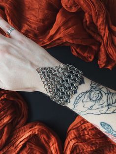 From the MARTYR chainmail collection, these simple bracelets will elevate any outfit with subtle gothic glamour. Just like the necklaces, this bracelet style comes in two regal variations - simple Duchess and embellished Princess. Handmade in a European 4 in 1 weave from solid stainless steel rings and joined with a stainless steel slide lock clasp. Find the MARTYR necklace collection here - https://www.etsy.com/uk/listing/1585268042 Chains are made to order by the centimetre. If you would like Chain Mail Fashion, Gothic Chain Bracelet Jewelry, Gothic Chain Bracelet, Adjustable Chainmail Chain Bracelet As A Gift, Black Stainless Steel Chainmail Jewelry, Metal Chainmail Bracelet, Gothic Stainless Steel Chainmail Jewelry, Silver Chainmail Chain Bracelet As Gift, Silver Chainmail Bracelet As A Gift