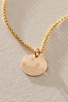 Add a personalized touch to your everyday jewelry with this cool constellation necklace featuring a durable 14k gold-filled design and hand-stamped detailing with a classic linked chain and lobster clasp closure. **Features:** Gold-filled sterling silver, hypoallergenic, durable design, disc-shaped pendant with constellation design, hand-stamped detail, classic chain with lobster clasp closure, fixed length **Why We ❤ It:** This dainty necklace makes for a great gift! | OXB Sweatproof Constellat Constellation Design, Gemini And Sagittarius, Pisces And Capricorn, Gemini And Virgo, Fringed Belt, Talisman Necklace, Trending Necklaces, Chain Strap Bag, Constellation Necklace