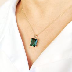 This stunning pendant is set in 14K Solid Yellow Gold with Deep Green Emerald Hydro in classic prong setting. It is an unique gemstone pendant for nearly every occasion and is completely hassle-free jewelry. ◾ITEM DETAILS * Gem: Emerald Hydro * Gem Size: 10X12mm * Gem Shape: Octagon cut * Gem Weight: 5.50 carats * Gold Purity: 14KT  * Gold Weight: 0.97gram * Total Weight of the Pendant: 2.07 gram The Gold purity is guaranteed and it comes with authentic 14KT gold hallmark. Since my items are han Elegant Emerald Pendant Gemstones, Elegant Emerald Pendant Birthstone Necklace, Elegant Faceted Emerald Gemstones, Elegant Emerald Necklace With Large Pendant, Elegant May Birthstone Pendant Gemstones, Emerald Pendant Gemstone, May Birthstone Jewelry With Emerald Cut Gemstone Accents, Emerald Cut Gemstone Jewelry For May Birthstone, Elegant Emerald-cut Birthstone Gemstones