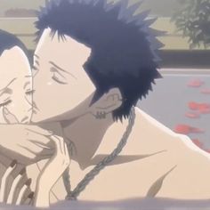 two anime characters one is kissing the other has black hair and no shirt on his chest