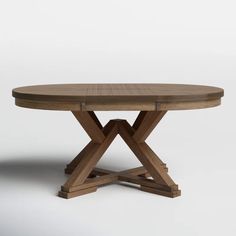 a round wooden table with two crossed legs and a cross - leg design on the top