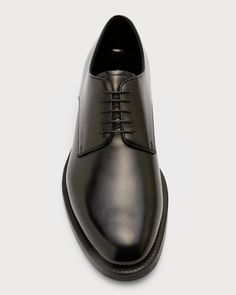 The iconic Giorgio Armani derby shoe provides both style and comfort for any business occasion. Crafted from only the finest smooth Italian leather, these shoes will age beautifully while hugging your foot. A delicate 1' stacked heel and rounded toe give a polished silhouette, while the lace-up front allows a snug fit. Slip them on with your smart trousers for elegance through the workday. Built to last in Italy, they offer timeless sophistication to complement any modern wardrobe. Armani Shoes Mens, Armani Shoes, Derby Shoe, Smart Trousers, Mens Formal, Armani Men, Modern Wardrobe, Aging Beautifully, Shoes Dress