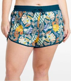 Built for comfort and performance, these printed swim shorts make it easy to dive into any watersport and go from one activity to the next with ease. 3" inseam. Mid-rise. UPF 50+ rated fabric blocks at least 97. 5% of the sun's UV rays - 10x more than a white cotton tee. Body: 82% recycled nylon with 18% Lycra® spandex. Lining: 90% recycled nylon with 10% Lycra® spandex. The premium Italian-blend is breathable, quick drying and abrasion resistant. Handwash, line dry. Petal hem. Internal brief ma Sporty Printed Short Bottoms, Printed Sports Shorts, Casual Swim Skirt For Swimming, Casual Sports Shorts For Vacation, Tropical Short Swimwear For Sports, Green Casual Water Sports Bottoms, Green Casual Bottoms For Water Sports, Casual Green Shorts For Water Sports, Casual Green Bottoms For Water Sports